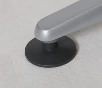 Two anti-slip glides are applied to each leg for stability.